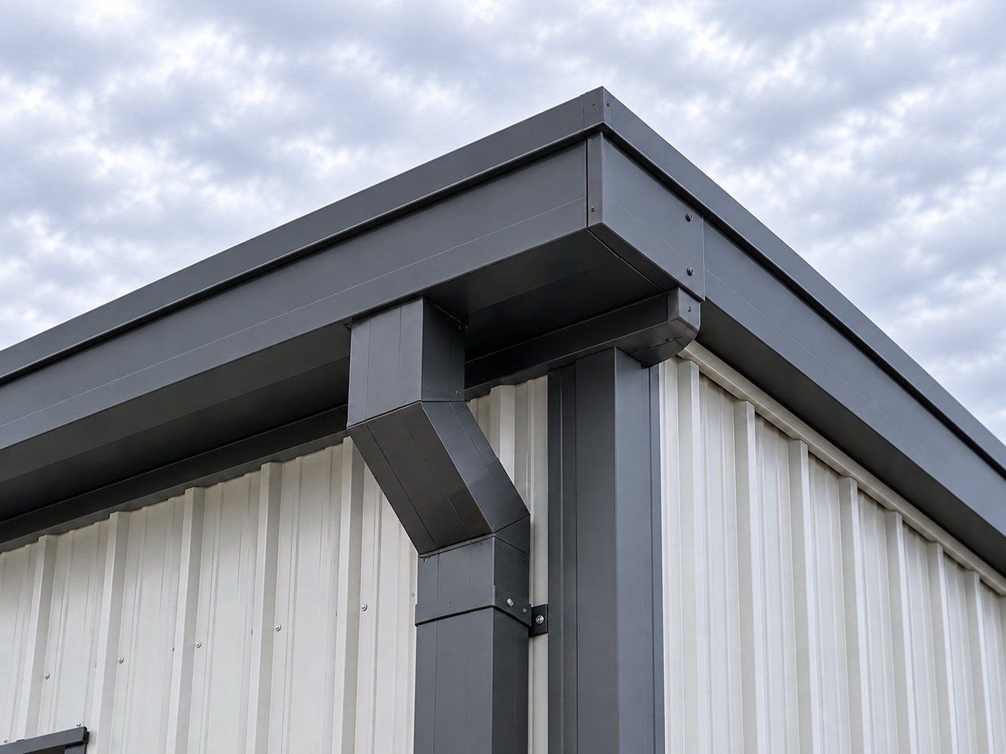Commercial gutter system with gutter guards installed on a commercial property